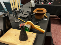 Picture of props and sound effects used for Magic Lantern presentation of Edgar Allan Poe's "The Tell-Tale Heart."