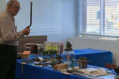 John Darling with one of the many antique tools from his collection